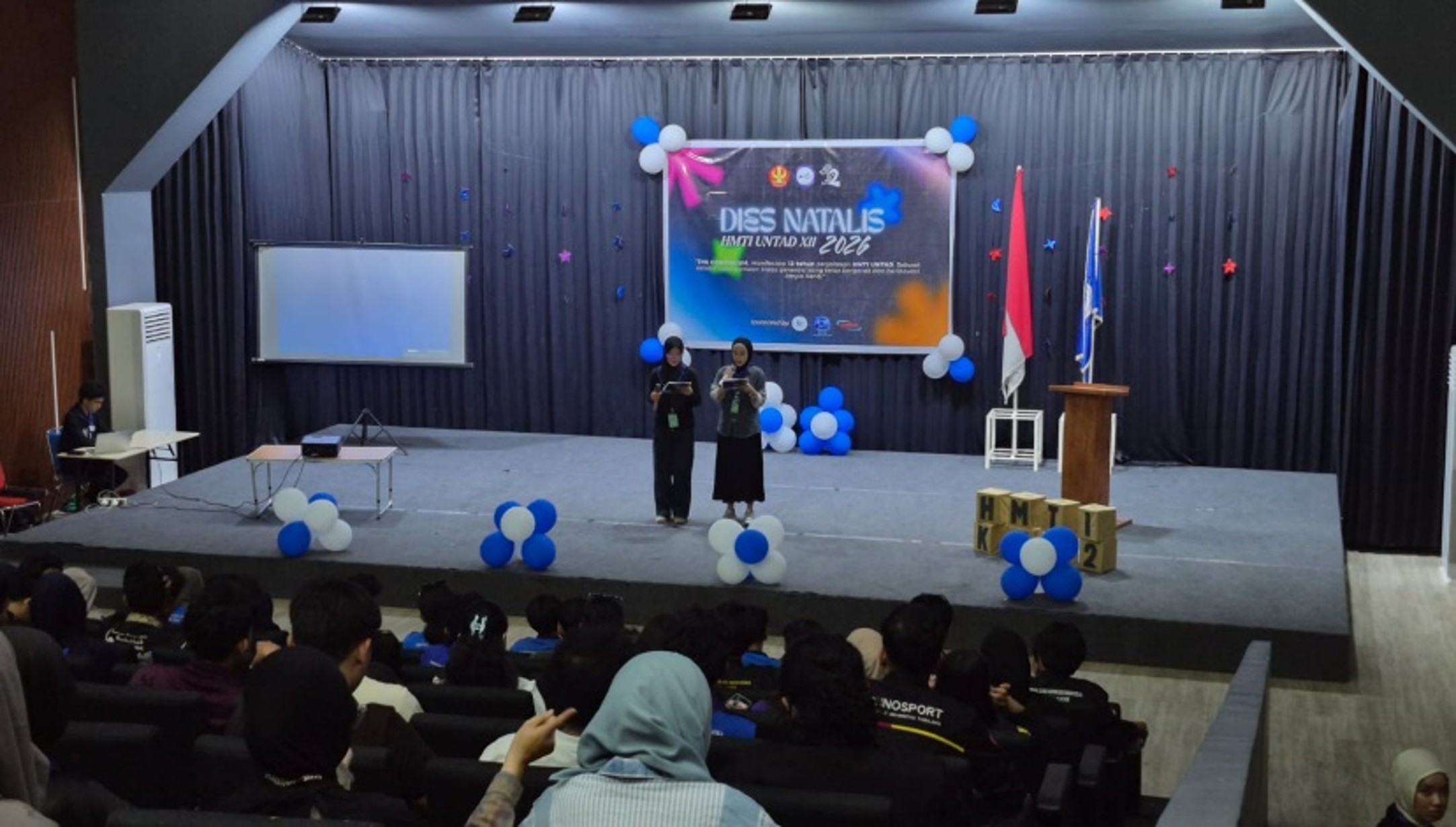 Thumbnail HMTI UNTAD Gelar Malam Puncak Dies Natalis Ke-12 dengan Tema “The Continuum: Colors of Our Journey”
